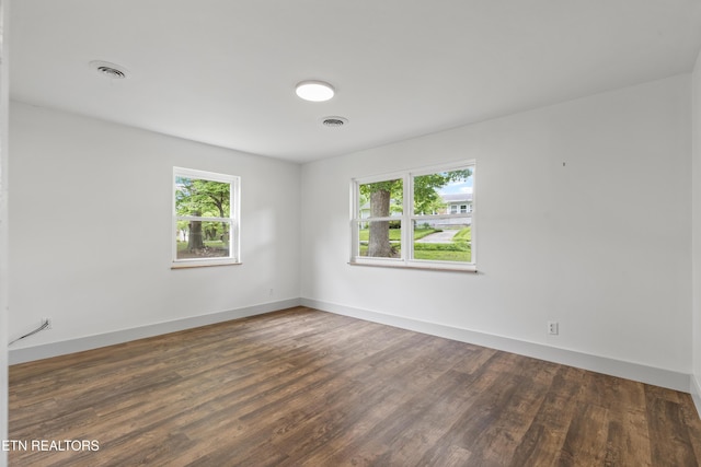 4525 Fawnie Ln, Knoxville, TN 37918 - empty room with healthy amount of natural light, wood finished floors, and baseboards