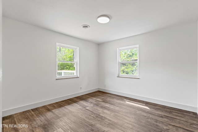 4525 Fawnie Ln, Knoxville, TN 37918 - unfurnished room with healthy amount of natural light, wood finished floors, and baseboards