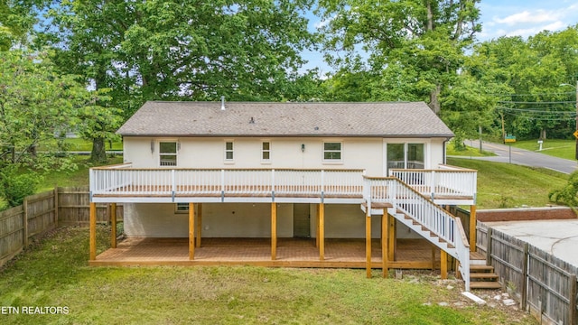 4525 Fawnie Ln, Knoxville, TN 37918 - rear view of property featuring a deck, stairway, roof with shingles, and view of scattered trees