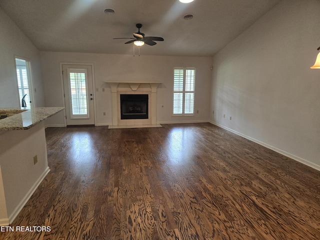 678 Applegate Ln Unit 33, Knoxville, TN 37934 - unfurnished living room with vaulted ceiling, healthy amount of natural light, a ceiling fan, dark wood finished floors, and baseboards