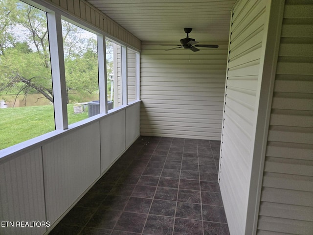 678 Applegate Ln Unit 33, Knoxville, TN 37934 - unfurnished sunroom featuring ceiling fan