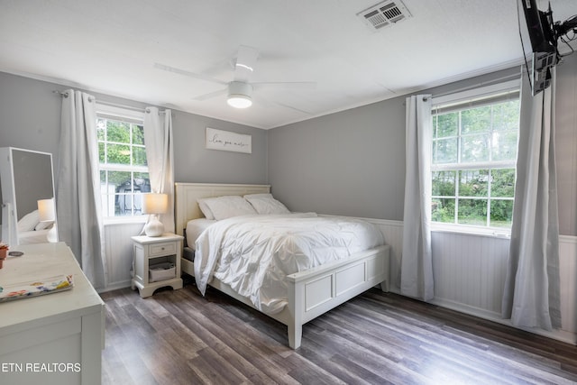 122 Mill Rd, Wartburg, TN 37887 - bedroom featuring wainscoting, dark wood-type flooring, and ceiling fan