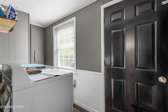 122 Mill Rd, Wartburg, TN 37887 - washroom with washer / clothes dryer, a decorative wall, wood finished floors, and a wainscoted wall