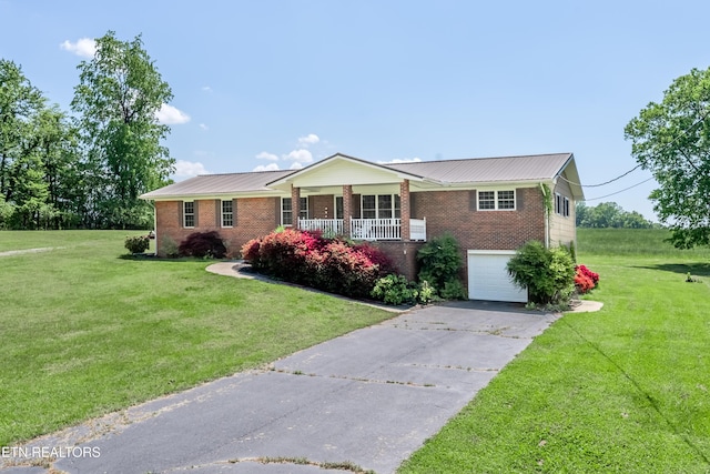 917 Swan Pond Circle Rd, Harriman, TN 37748 - ranch-style home featuring brick siding, an attached garage, and a front yard