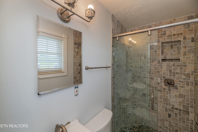 917 Swan Pond Circle Rd, Harriman, TN 37748 - bathroom with a stall shower, toilet, and a textured ceiling