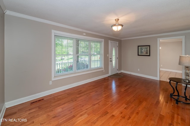 917 Swan Pond Circle Rd, Harriman, TN 37748 - entryway featuring light wood-style floors, crown molding, and baseboards