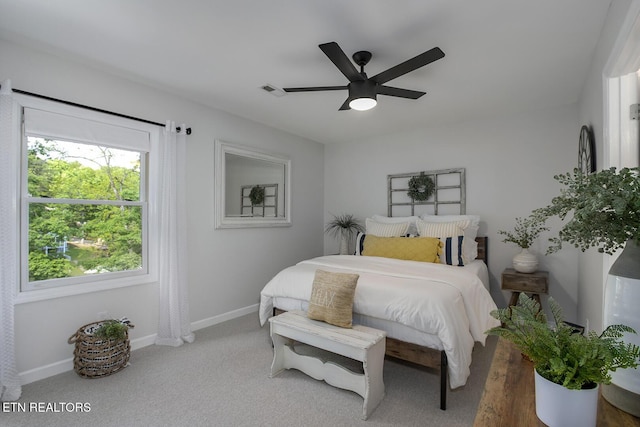 bedroom with baseboards and ceiling fan