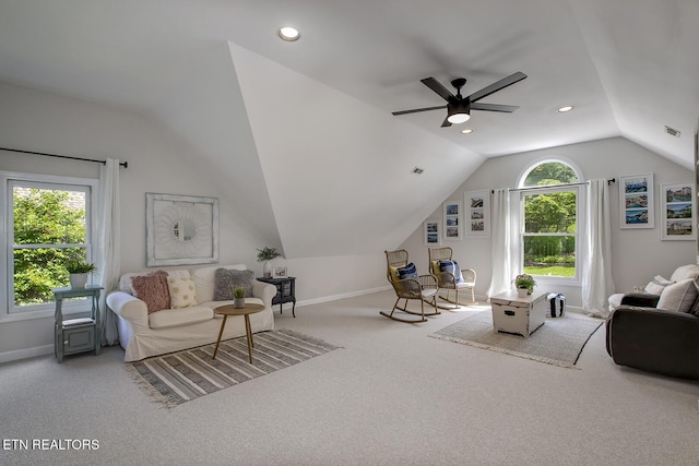 living room featuring carpet, vaulted ceiling, baseboards, ceiling fan, and recessed lighting