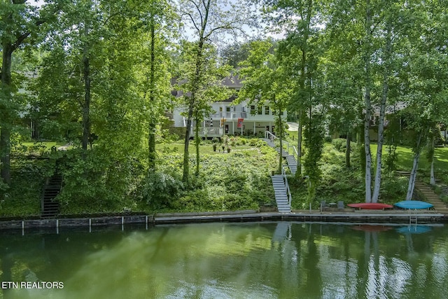 dock with stairs and a water view