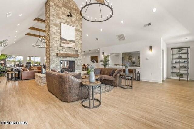 8143 Gold Bell St Lot 20, Powell, TN 37849 - living room with high vaulted ceiling, wood finished floors, baseboards, a chandelier, and recessed lighting