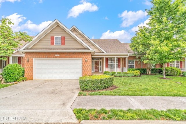 111 Devanshire Ct, Oak Ridge, TN 37830 - traditional home featuring brick siding, driveway, a front yard, and covered porch