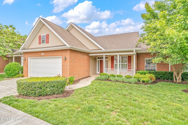 111 Devanshire Ct, Oak Ridge, TN 37830 - traditional-style home featuring covered porch, brick siding, driveway, a front yard, and a shingled roof
