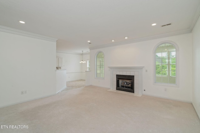 111 Devanshire Ct, Oak Ridge, TN 37830 - unfurnished living room featuring ornamental molding, a tile fireplace, a chandelier, light colored carpet, and recessed lighting