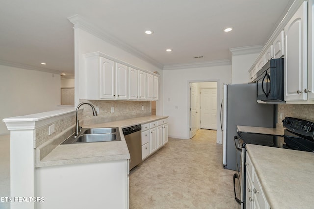 111 Devanshire Ct, Oak Ridge, TN 37830 - kitchen featuring black microwave, electric range, a sink, dishwasher, and white cabinets