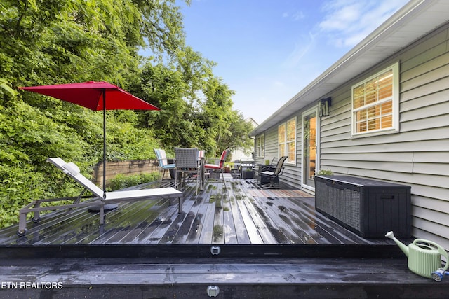 134 Jordan Dr, Caryville, TN 37714 - wooden terrace featuring outdoor dining area