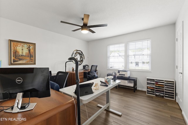 134 Jordan Dr, Caryville, TN 37714 - office area featuring a ceiling fan, wood finished floors, and baseboards