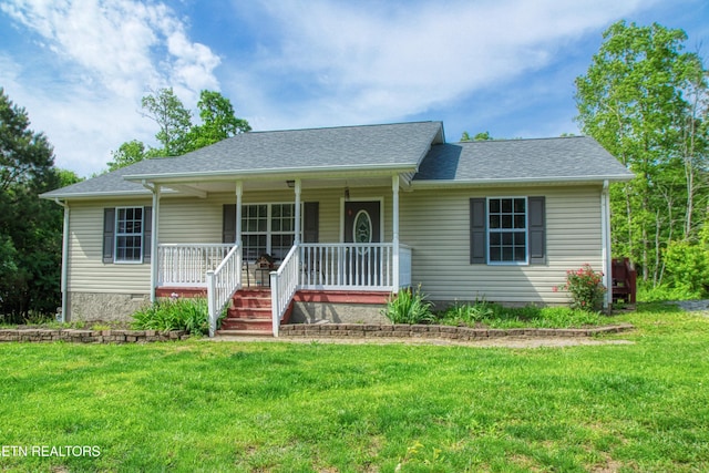 634 Robs Rd, Grimsley, TN 38565 - ranch-style house featuring covered porch, a front lawn, and roof with shingles