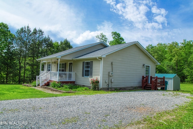 634 Robs Rd, Grimsley, TN 38565 - single story home with crawl space, covered porch, a shed, and an outdoor structure