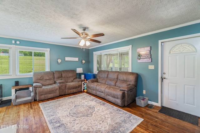 101 Temple Rd, Oak Ridge, TN 37830 - living area with plenty of natural light, hardwood / wood-style flooring, a ceiling fan, a textured ceiling, and ornamental molding