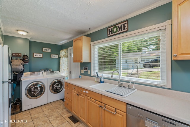 101 Temple Rd, Oak Ridge, TN 37830 - laundry room with a sink, washing machine and dryer, crown molding, a textured ceiling, and light tile patterned floors
