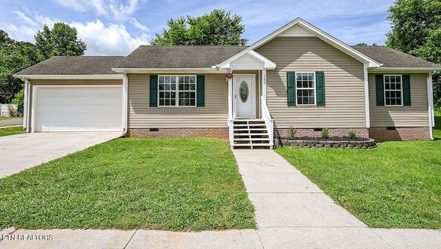 169 Claire St, Benton, TN 37307 - view of front of home featuring crawl space, a garage, a front lawn, driveway, and a shingled roof