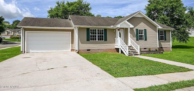 169 Claire St, Benton, TN 37307 - view of front of home featuring crawl space, a garage, concrete driveway, a front yard, and a shingled roof