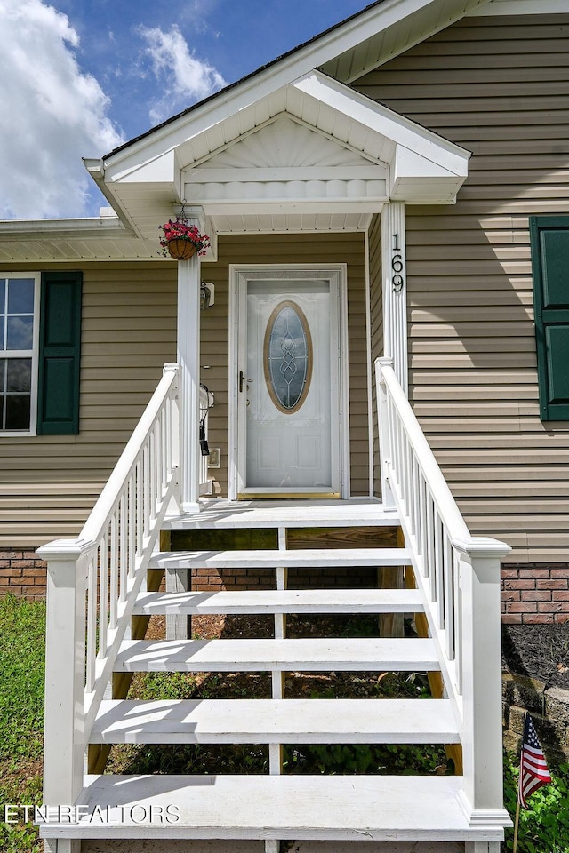 169 Claire St, Benton, TN 37307 - view of exterior entry featuring brick siding