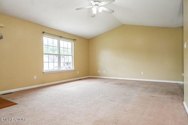 169 Claire St, Benton, TN 37307 - carpeted empty room with ceiling fan, vaulted ceiling, and baseboards