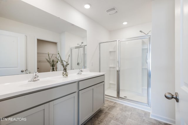 1024 Curly Top Ln, Knoxville, TN 37932 - full bath with a shower stall, double vanity, and a walk in closet