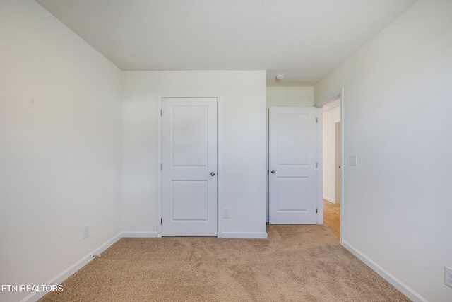 1024 Curly Top Ln, Knoxville, TN 37932 - unfurnished bedroom with light carpet and baseboards