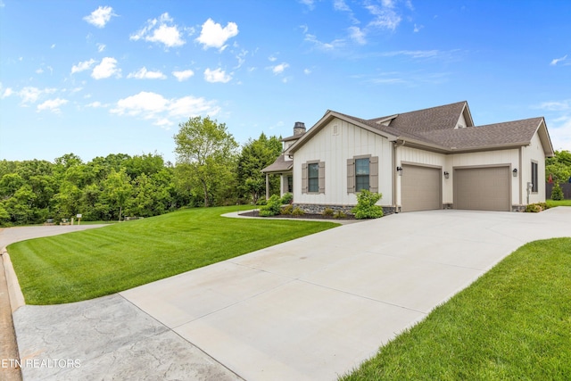 209 Fence Post Ln, Knoxville, TN 37934 - view of front of property with a garage, a front lawn, board and batten siding, driveway, and a chimney