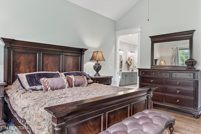 209 Fence Post Ln, Knoxville, TN 37934 - bedroom with lofted ceiling, light wood finished floors, and ensuite bathroom