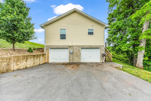 garage with driveway