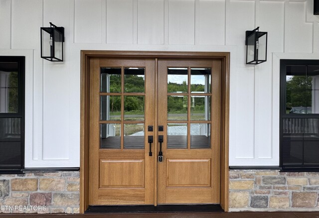 151 Clear Creek Rd, Newport, TN 37821 - view of exterior entry with french doors and stone siding