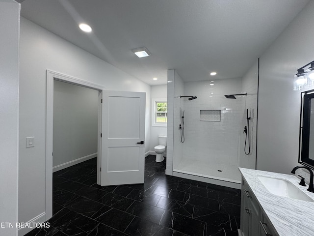 151 Clear Creek Rd, Newport, TN 37821 - bathroom with toilet, a tile shower, vanity, marble look tiles, and baseboards