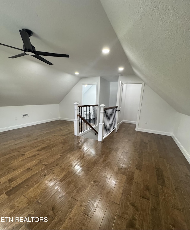 151 Clear Creek Rd, Newport, TN 37821 - bonus room featuring vaulted ceiling, dark wood-type flooring, ceiling fan, baseboards, and a textured ceiling