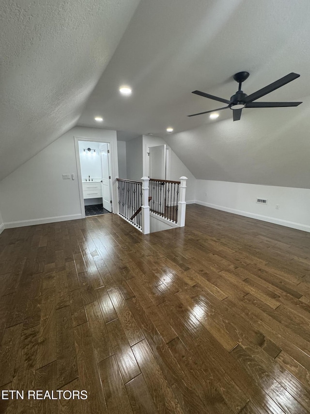 151 Clear Creek Rd, Newport, TN 37821 - bonus room featuring vaulted ceiling, hardwood / wood-style floors, baseboards, ceiling fan, and a textured ceiling