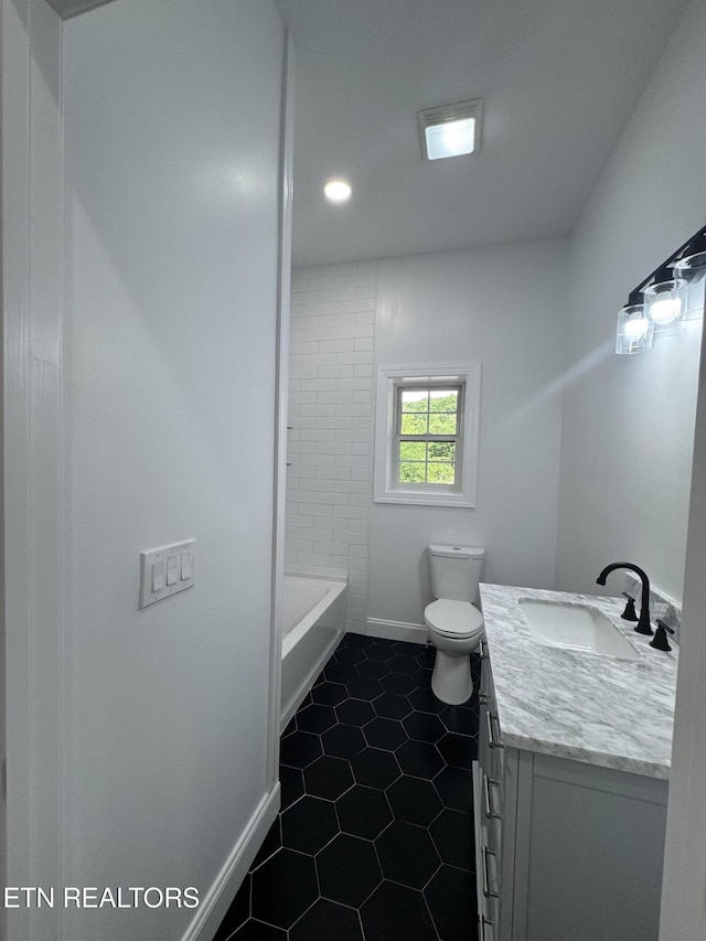 151 Clear Creek Rd, Newport, TN 37821 - bathroom with vanity, tile patterned floors, baseboards, toilet, and a tub