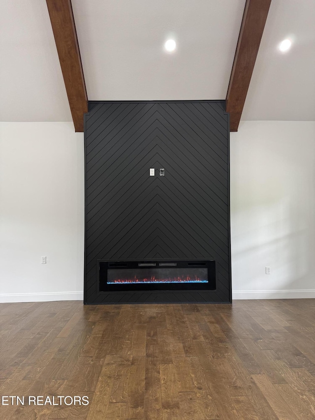 151 Clear Creek Rd, Newport, TN 37821 - detailed view of beam ceiling, a fireplace, wood finished floors, and baseboards