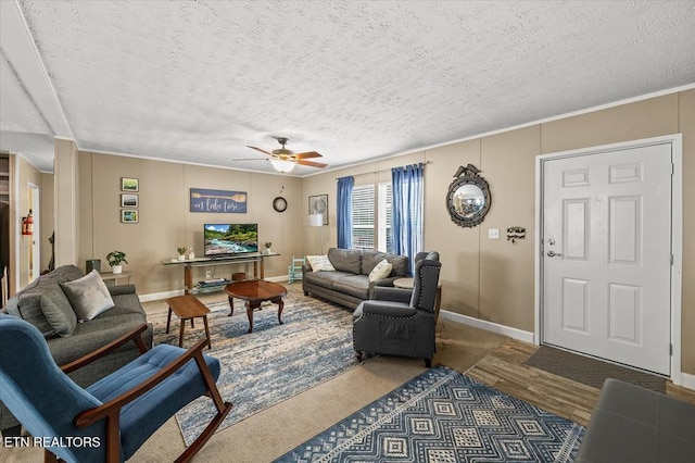 2061 Bolestown Loop, Alpine, TN 38543 - living room featuring ceiling fan, baseboards, crown molding, and a textured ceiling