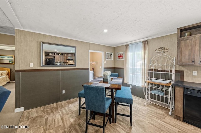 2061 Bolestown Loop, Alpine, TN 38543 - dining room featuring ornamental molding, a textured ceiling, and wainscoting