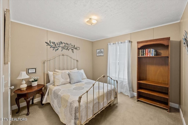2061 Bolestown Loop, Alpine, TN 38543 - carpeted bedroom featuring ornamental molding, a textured ceiling, and baseboards