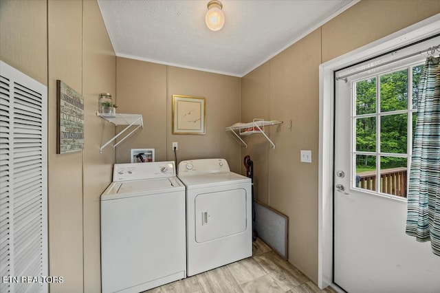 2061 Bolestown Loop, Alpine, TN 38543 - laundry area with separate washer and dryer, crown molding, and a textured ceiling