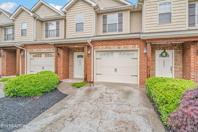 4834 Fountain View Way, Knoxville, TN 37918 - view of property with a garage, concrete driveway, and brick siding