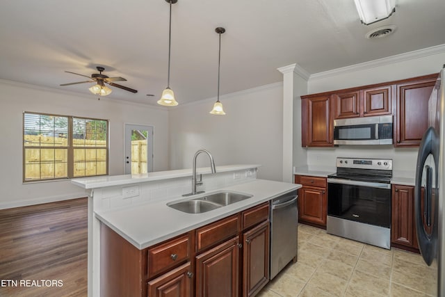 4834 Fountain View Way, Knoxville, TN 37918 - kitchen with appliances with stainless steel finishes, a sink, light countertops, a ceiling fan, and an island with sink