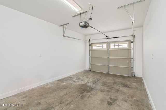 4834 Fountain View Way, Knoxville, TN 37918 - garage featuring a garage door opener and baseboards
