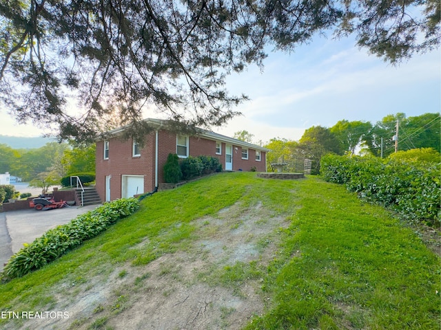 161 Cedar Ln, Rocky Top, TN 37769 - view of yard featuring driveway and an attached garage