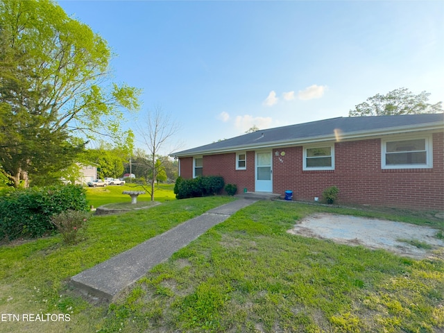 161 Cedar Ln, Rocky Top, TN 37769 - single story home featuring a front lawn and brick siding