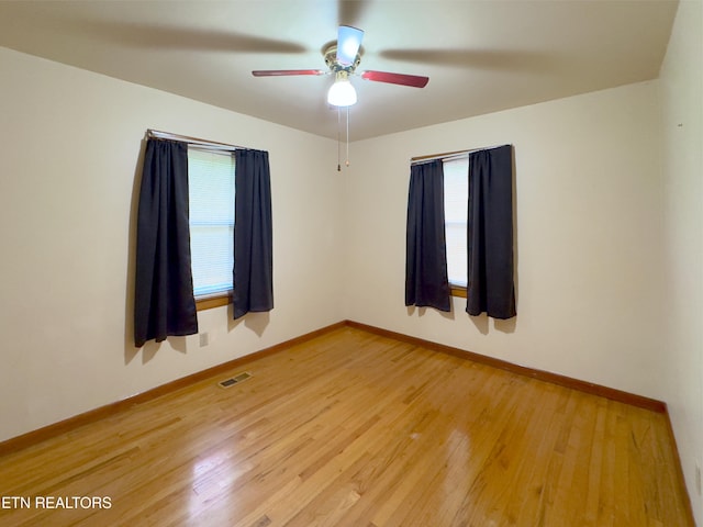 161 Cedar Ln, Rocky Top, TN 37769 - spare room with baseboards, light wood finished floors, and ceiling fan