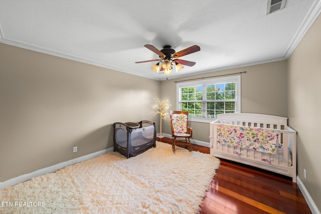 1090 Snow Hill Rd, Oakdale, TN 37829 - bedroom featuring ornamental molding, baseboards, wood finished floors, and a ceiling fan